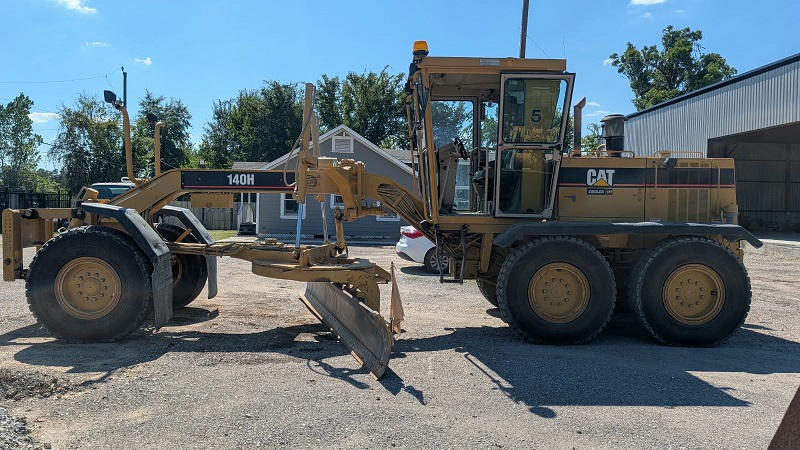 1999 Caterpillar 140H Motor Grader Rear Tandem Wheels and Engine Compartment Enclosure