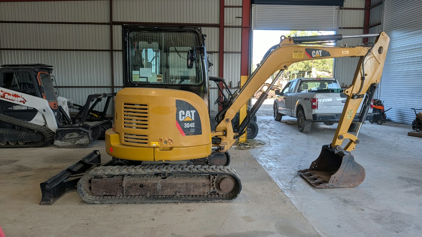 Rear perspective of 2015 Caterpillar 304E CR excavator used equipment for sale