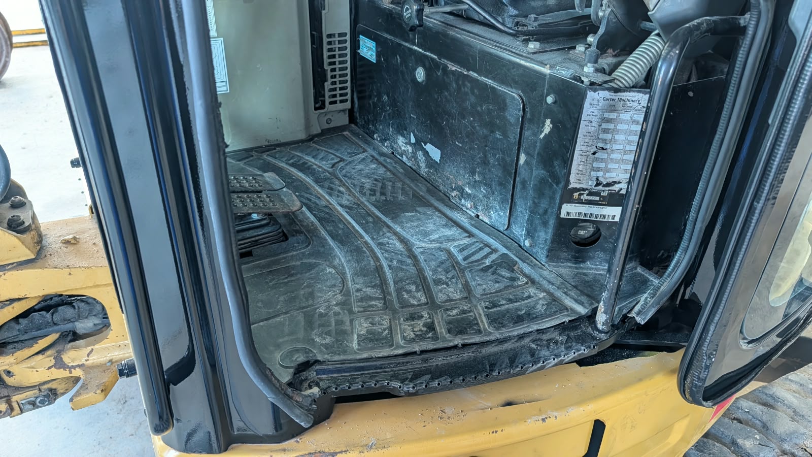 2015 Caterpillar 304E CR Mini Hydraulic Excavator Operator Footrest Area and Lower Cab Floor Mat